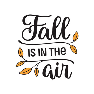 Fall is in the air hand lettering composition with yellow leaves