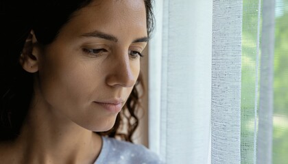 Sad Woman with Melancholic Expression and Downturned Eyes