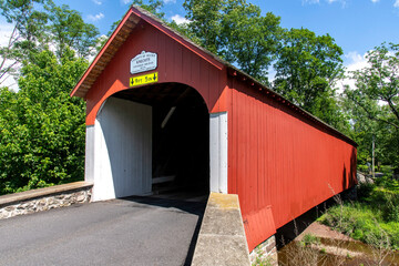 Historic Knecht's Covered bridge in Springfield Township, Bucks County crossing Cooks Creek on Knecht Bridge Road south of Springtown, PA, USA