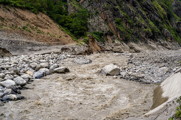 the Rasuwagadhi flood destroying a Friendship bridge, road, a hydropower substation, and sweeping...