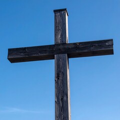Fototapeta premium Wooden cross against clear blue sky