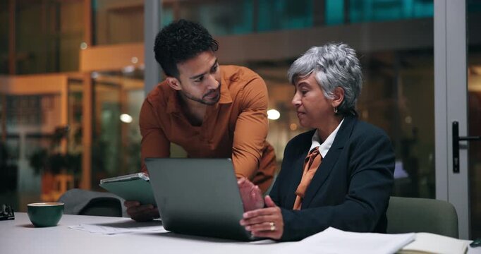 Business people, tablet and teamwork with laptop at night for budget review, finance or forecasting. Office, financial analyst and tech for data comparison, growth projection and company performance