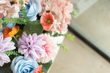 A beautifully arranged mixed flower bouquet featuring a variety of colorful blossoms, textures, and floral types. Perfect for themes related to celebration, decoration, love, nature, and gifting.