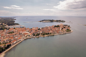Aerial drone view of historic Porec coastline, Croatia.