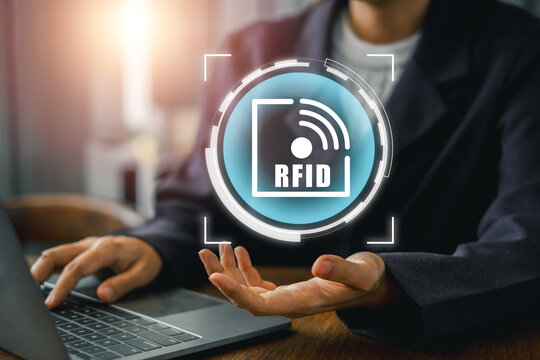 Visual representation of RFID technology showcasing digital interface and hand scanning for efficient data management and communication.