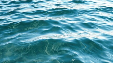 Fototapeta premium Calm blue ocean water with gentle ripples creating subtle patterns across the surface