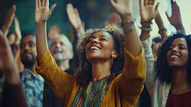 Diverse group worshiping with hands raised - Powered by Adobe