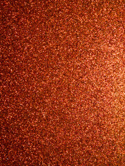 Sparkling orange glitter textured background backdrop for design