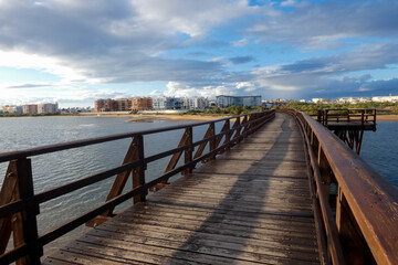 Wooden footbridge crossing In Huelva, Isla Cristina, Spain