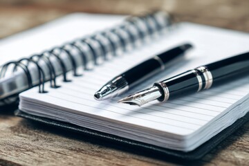 Notebook, pens, lined paper, writing