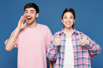 Young fun couple two friends family man woman they wear pink casual clothes together scream sharing...