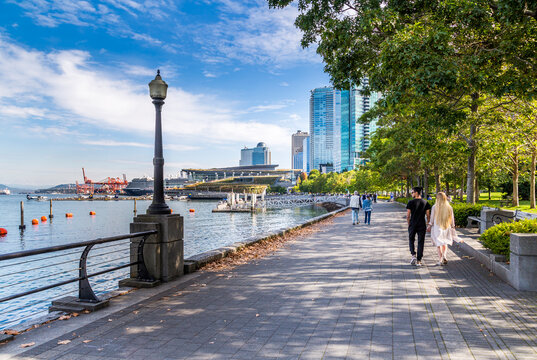 Sea Wall Walk overlooking Vancouver Harbour near the Convention Centre, Vancouver, British Columbia, Canada