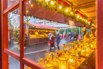 Christmas Market Stalls and shoppers in Leicester Square, London, England