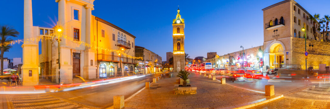 View of The Clock Tower and trail lights at dusk, Jaffa Old Town, Tel Aviv, Israel, Middle East