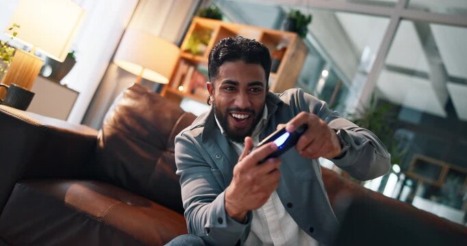 Man, video game and controller on sofa for competition, challenge and esports contest in living room. Person, gamer and click on couch with console, television or online battle for next level at home