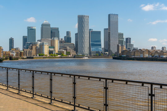 View of Canary Wharf Financial District from the Thames Path in Wapping, London, England