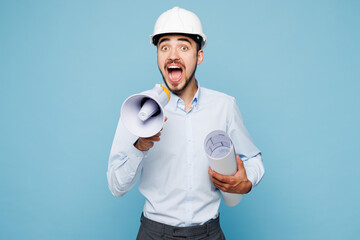 Young architect engineer designer employee man wear white clothes shirt hardhat scream in megaphone...