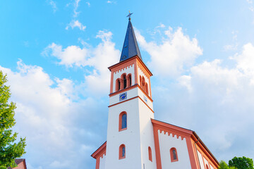Historic Church Tower Under Clear Blue Sky in Rossdorf Germany