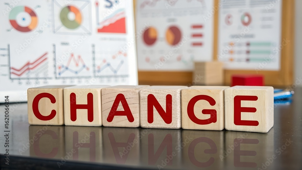 Poster the word change in wooden blocks symbolizing business transformation and growth with data charts in 