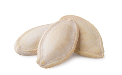 Pumpkin seeds close-up on a white. Isolated