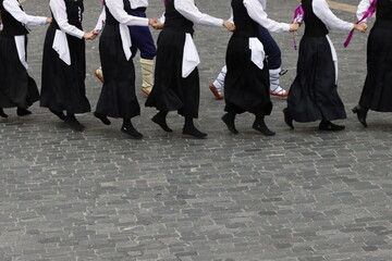 Basque folk dancers in the street