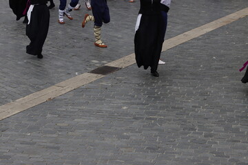 Basque folk dancers in the street