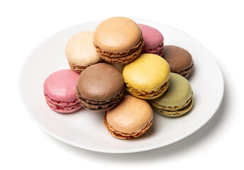 Small tasty sweet original classic macaroons cakes on plate isolated on white studio background