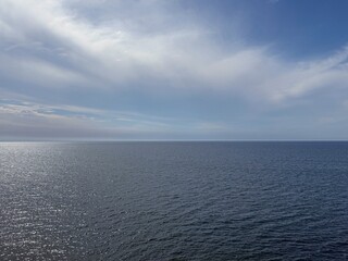 Ocean blue sparkling water and sky.