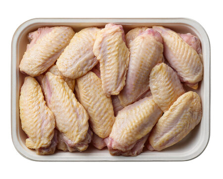 Fresh raw chicken wings arranged neatly in sealed plastic tray, ready for cooking, isolated on transparency background, perfect for meal preparation or grocery advertising