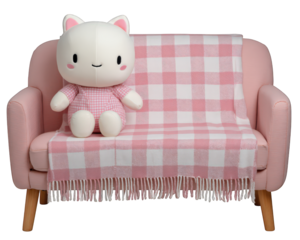 Plush cat doll pink sofa checkered throw blanket cute decor cozy living room soft toy pastel color home interior playful cheerful
