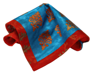 Blue silk fabric with floral pattern red border gold sheen elegant textile decorative luxurious soft square shape vibrant color folded cloth