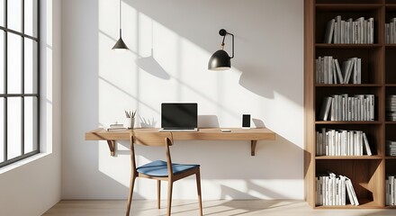 Modern desk setup with laptop and natural light