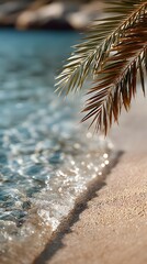 Palm leaf over waves on beach