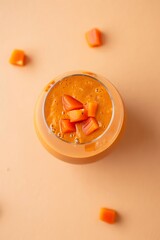 Flatlay Papaya Smoothie Chunks Pastel Apricot Surface