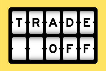 Black color in word trade off on slot banner with yellow color background