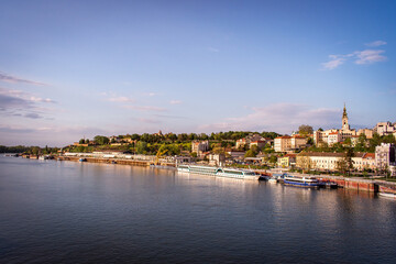 Panoramic view of the city of Belgrade and its architecture, the Danube River, and cruise ships...