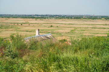 Idyllic view of a beautiful and peaceful farmhouse in the rural flatlands of Europe