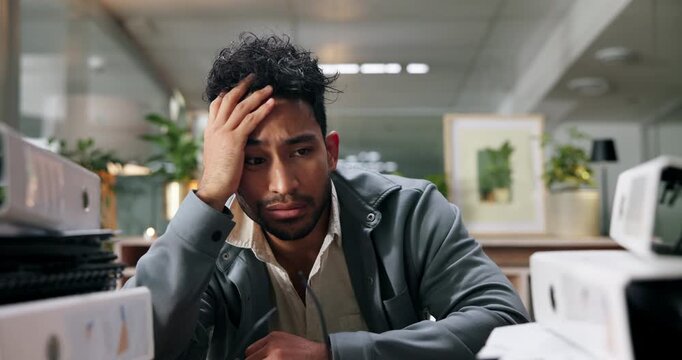 Pile, overwhelmed and businessman at desk with documents for deadline, tasks and work load. Thinking, office and person stress with paperwork, files and report for burnout, frustrated and overworked