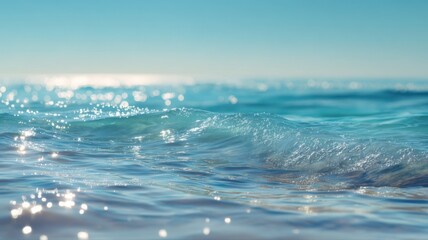 Clear Blue Ocean Water Surface with Gentle Waves under Bright Sky