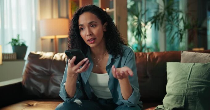Voice recognition, upset and woman with phone on sofa in home for contact, networking or connectivity. Cellphone, disappointed and person on mobile conversation with loudspeaker in living room.