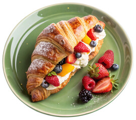 fruit and cream croissant on a green plate
