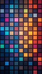 Abstract Background Displaying an Organized Grid of Various Colorful Solid Squares Creating a Modern Palette.