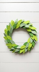 Green Leaf Wreath on White Wood Background Creating a Natural and Fresh Springtime Decor Statement for Your Home or Holiday Celebration