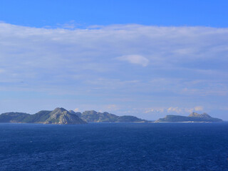 The Cies Islands under a thick layer of stratocumulus clouds