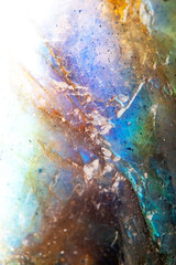 Beautiful close up of quartz crystal rock shard with reflective rainbow spiritual light