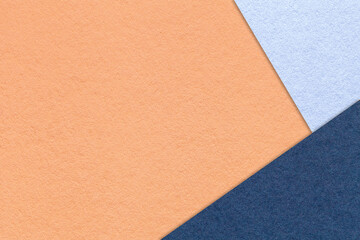 Abstract coral, sky and navy blue paper background with copy space. Template for presentation, banner, card design
