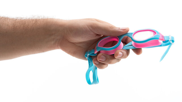 Hand with colorful swimming goggles