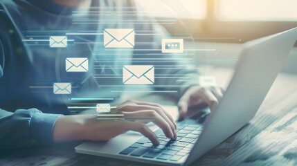 Email Communication: Hands Typing on Laptop with Overlayed Message Icons