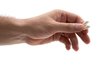 Hand holding cotton swabs delicately with care