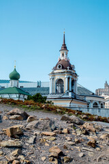 View of the rocky slope and the Church Bell Tower on a clear sunny day, Moscow.  Sights of Russia. Architecture of World tourism.
